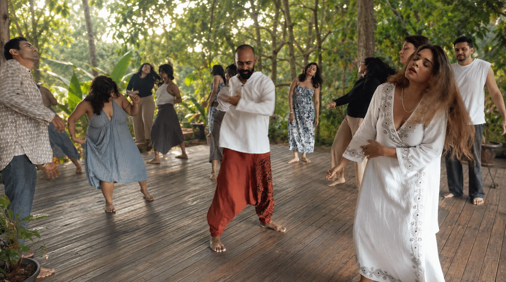 Participants moving freely on a wooden deck surrounded by trees